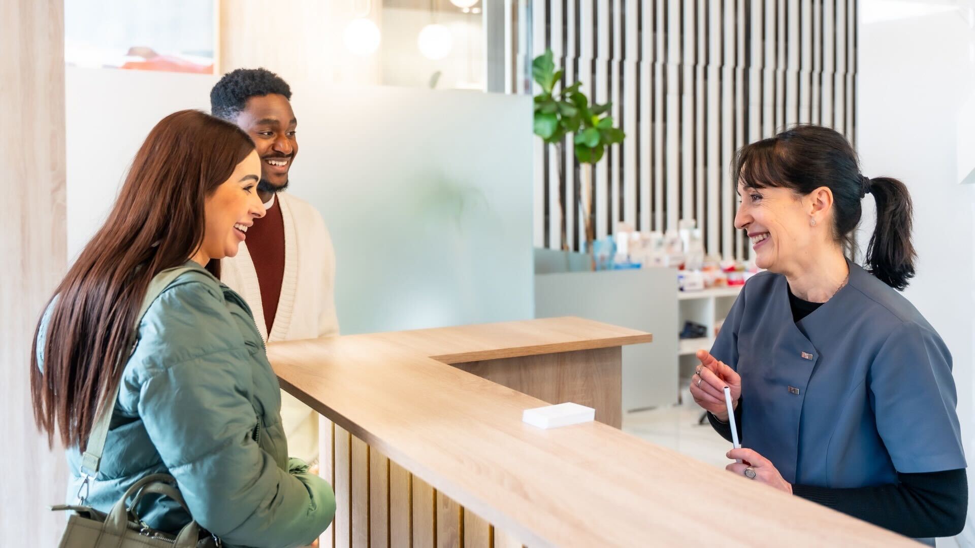 Warm welcome at reception — patients matched to specialists who listen